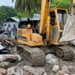 প্রথম স্ত্রীকে নিয়ে মালয়েশিয়ায় প্রবাসী, ক্ষোভে বুলডোজার দিয়ে বাড়ি গুঁড়িয়ে দিলেন শ্বশুরবাড়ির লোকজন